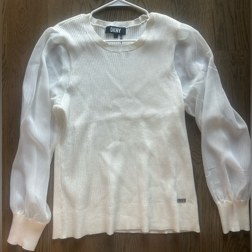 White sweater with sheer sleeves